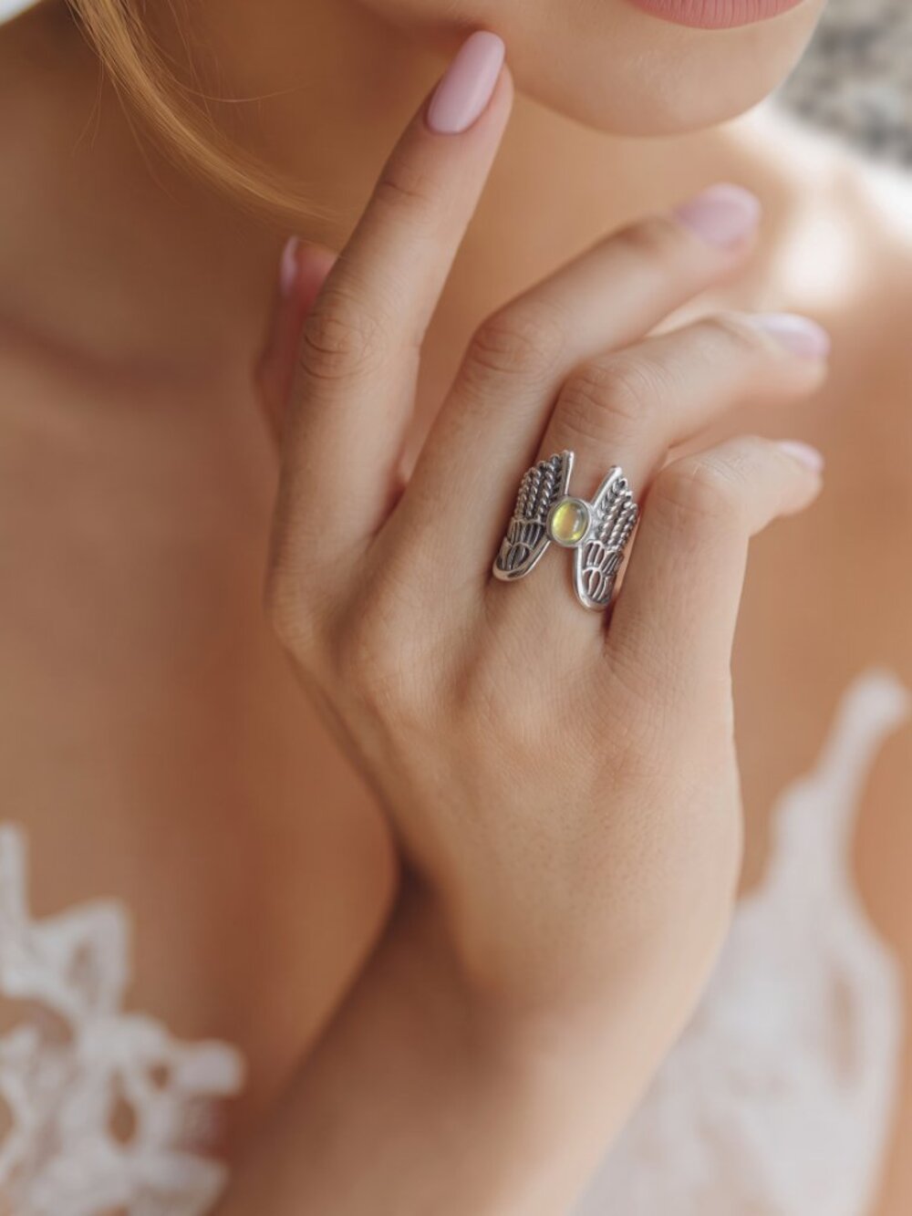 Silver Toned Metal Ring with a Iridescent Stone with Feathered Angel Wings